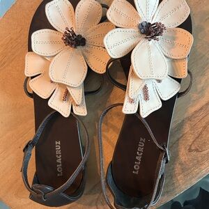 Lola Cruz cream floral and brown leather sandals.